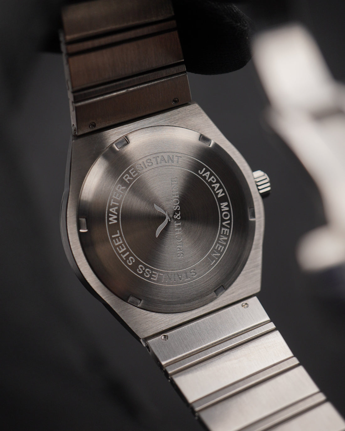 Engraved caseback of a Specht & Sohne automatic reading STAINLESS STEEL WATER RESISTANT and JAPAN MOVEMENT, with no calibre number to look up