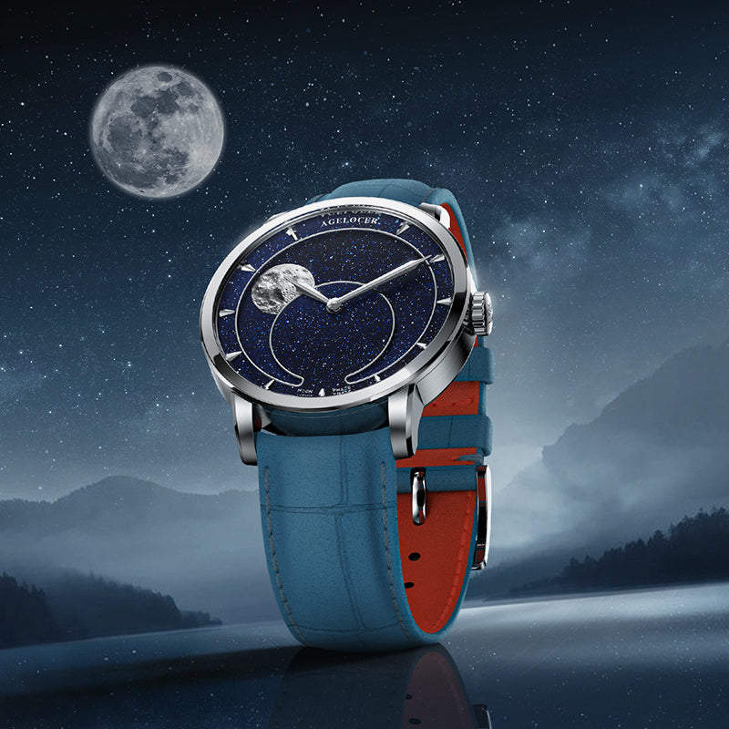 Agelocer Astronomer Moonphase with a blue aventurine dial on a teal leather strap, photographed against a moonlit night sky and lake