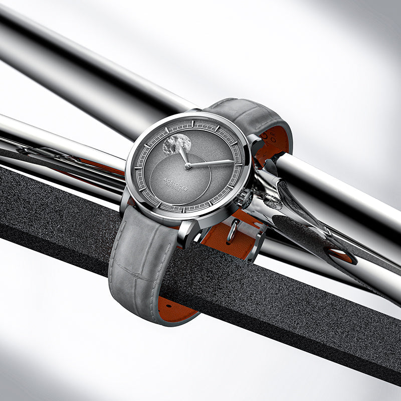 Agelocer Astronomer 29.5-Day Moonphase on a grey leather strap, showing the lug gap that sets watch strap sizes