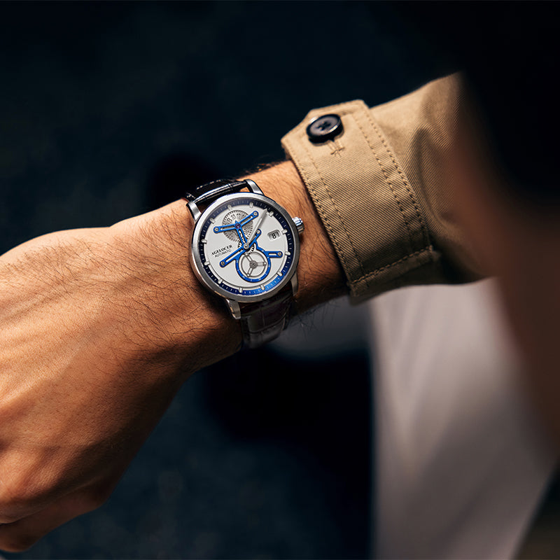 Agelocer Space Station Luminous automatic watch on the wrist, showing its separated-dial layout and blue hands
