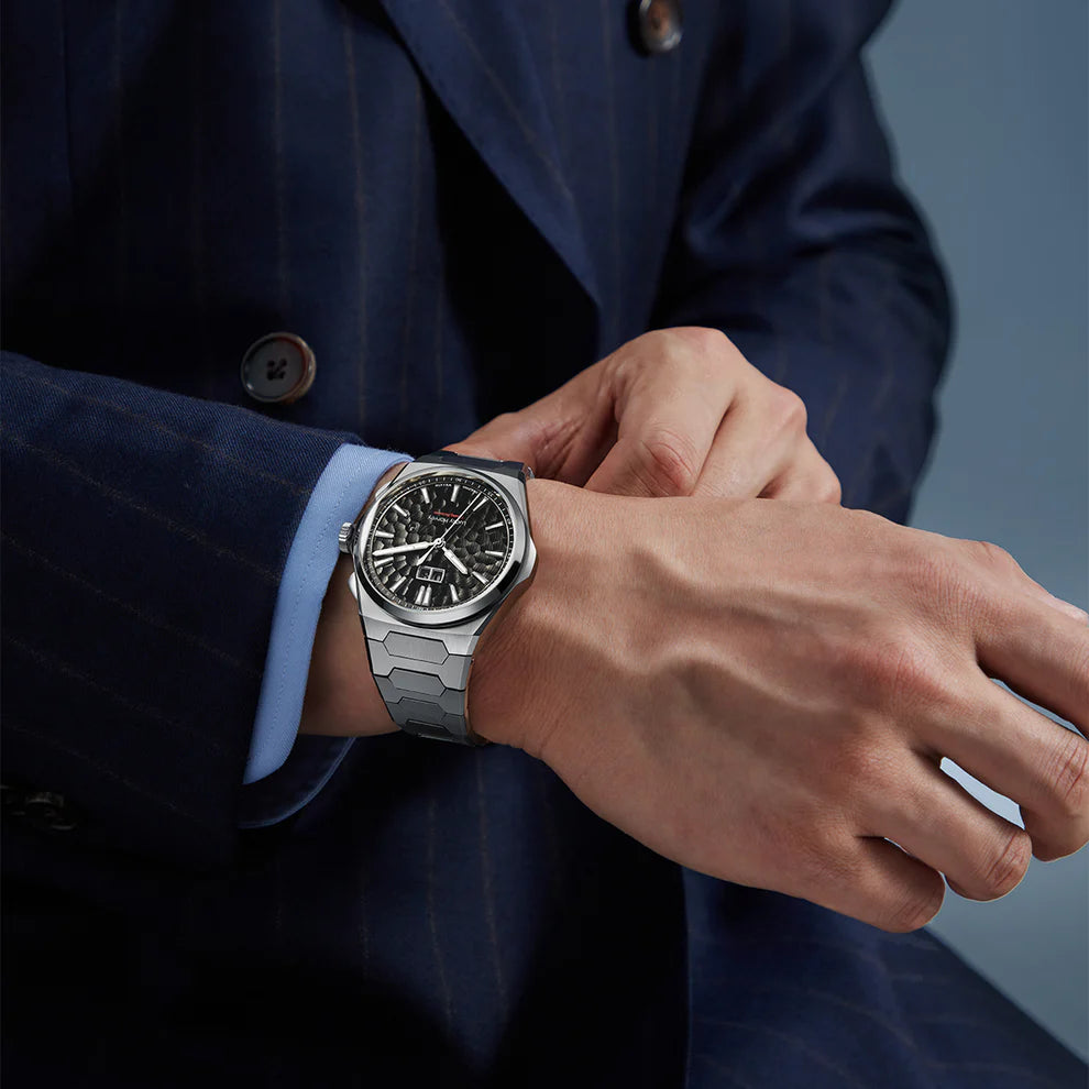 Lucky Harvey Sound of Nature ZLS402-2 chiming watch worn on the wrist with a navy pinstripe suit