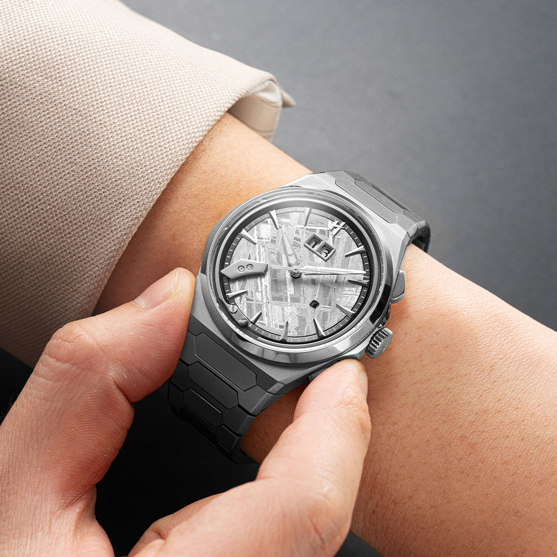 Lucky Harvey ZLS413-2 titanium meteorite chiming watch on the wrist, its Widmanstatten-patterned meteorite dial catching the light