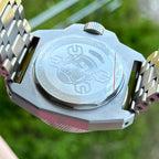 Engraved caseback of the STEELDIVE SD2212 fitted to its steel bracelet