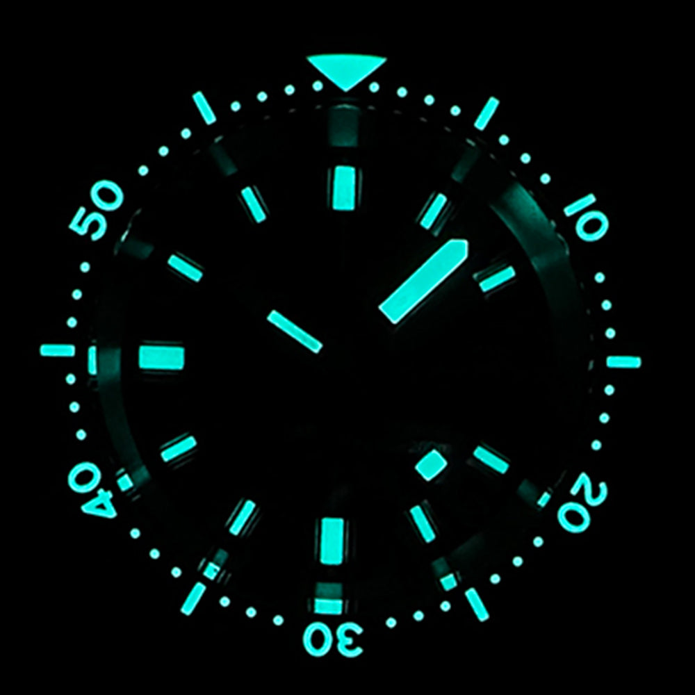 STEELDIVE SD1977T dial glowing blue in the dark, lume on the markers, hands and bezel