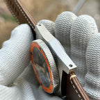 Side profile of the STEELDIVE SD2213 showing the coin-edge bezel and brushed case
