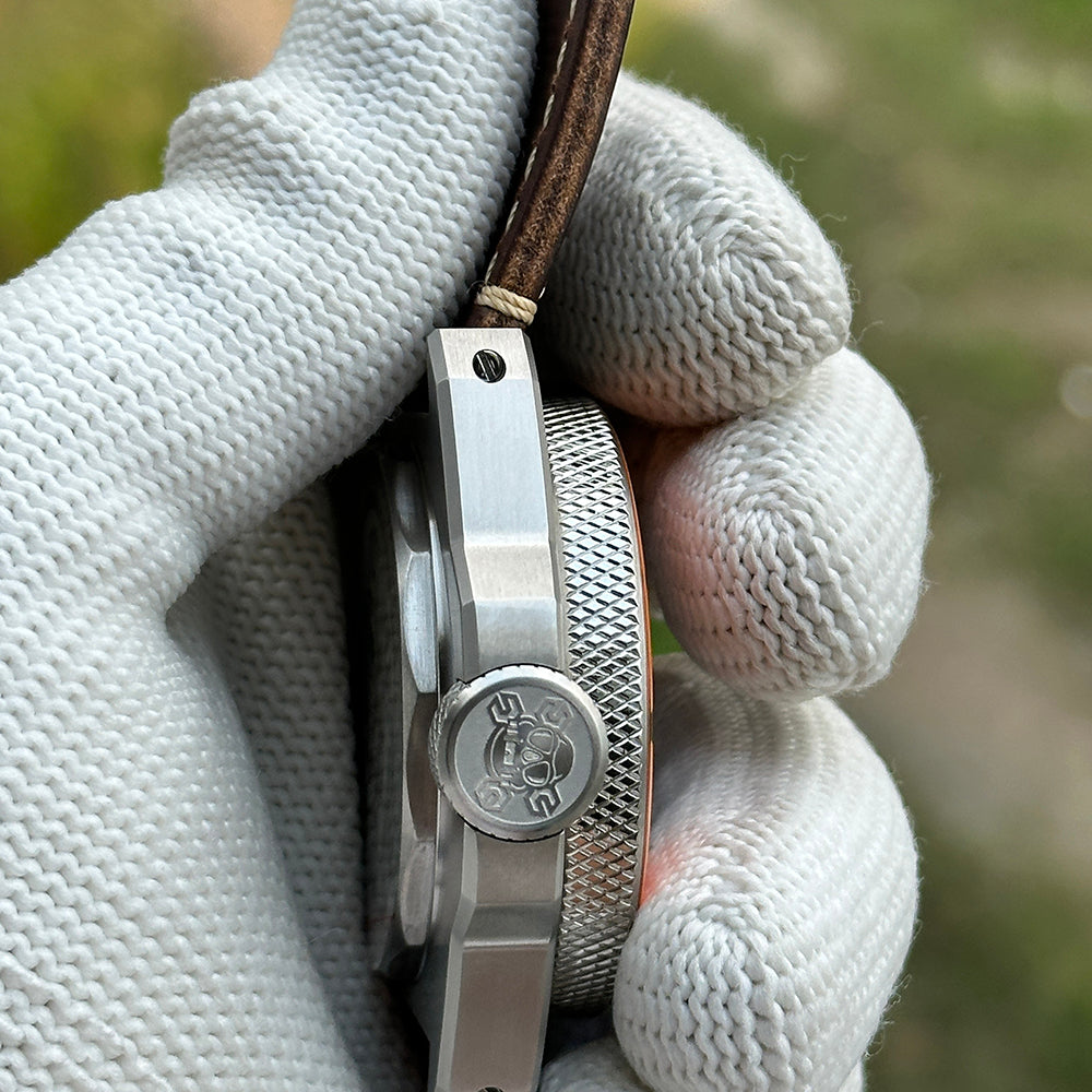 Side profile of the STEELDIVE SD2212 showing its signed screw-down crown