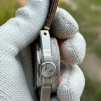 Side profile of the STEELDIVE SD2212 showing its signed screw-down crown