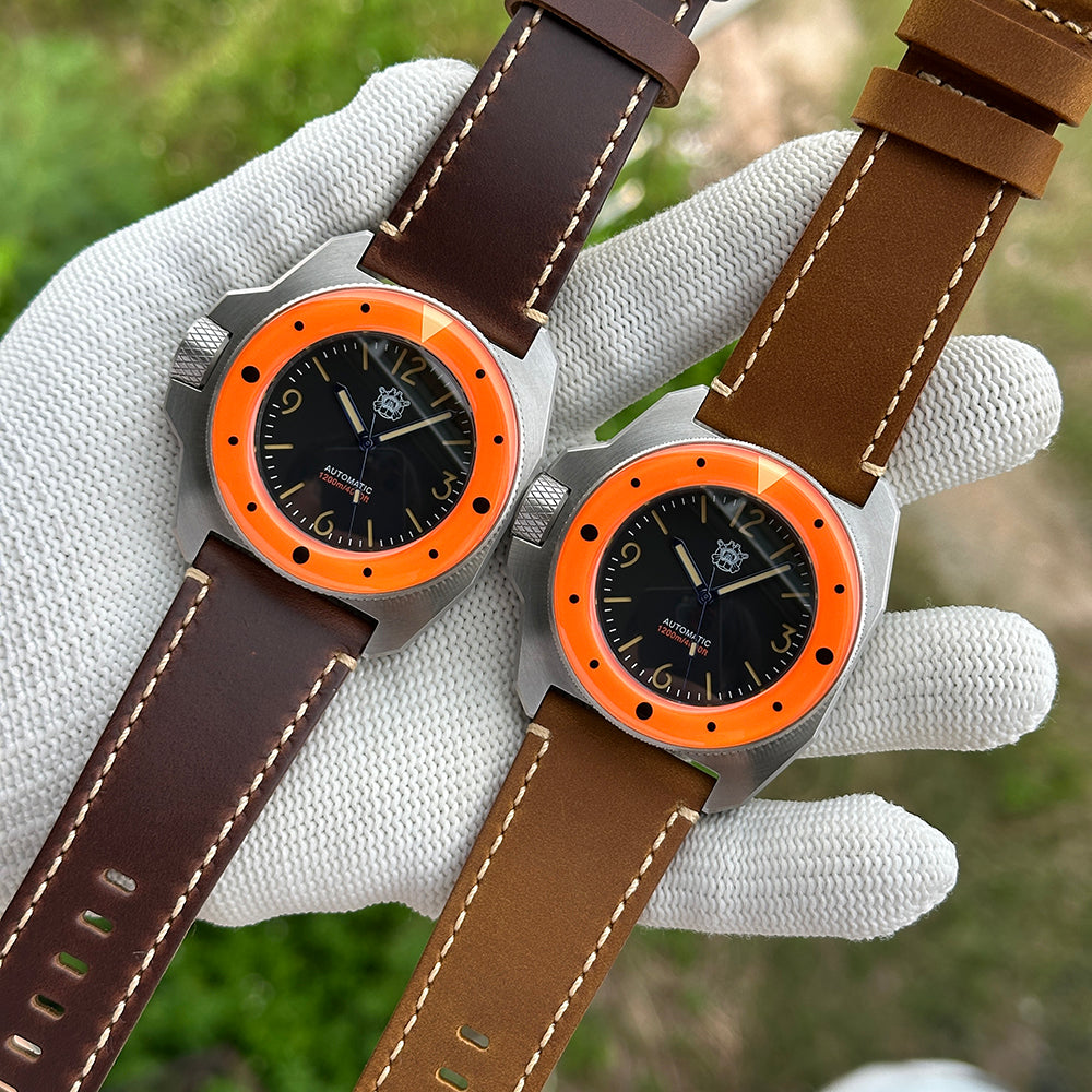 Two STEELDIVE SD2212 watches side by side on dark brown and light brown leather straps