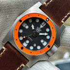 STEELDIVE SD2213 41mm orange bezel dive watch with black dial on a dark brown leather strap