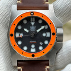 STEELDIVE SD2213 black dial with round lume plots and orange bezel on brown leather