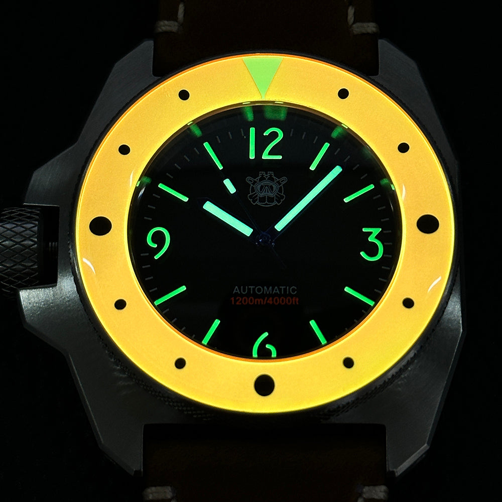 STEELDIVE SD2212 glowing in the dark, orange bezel lit yellow and the numerals green