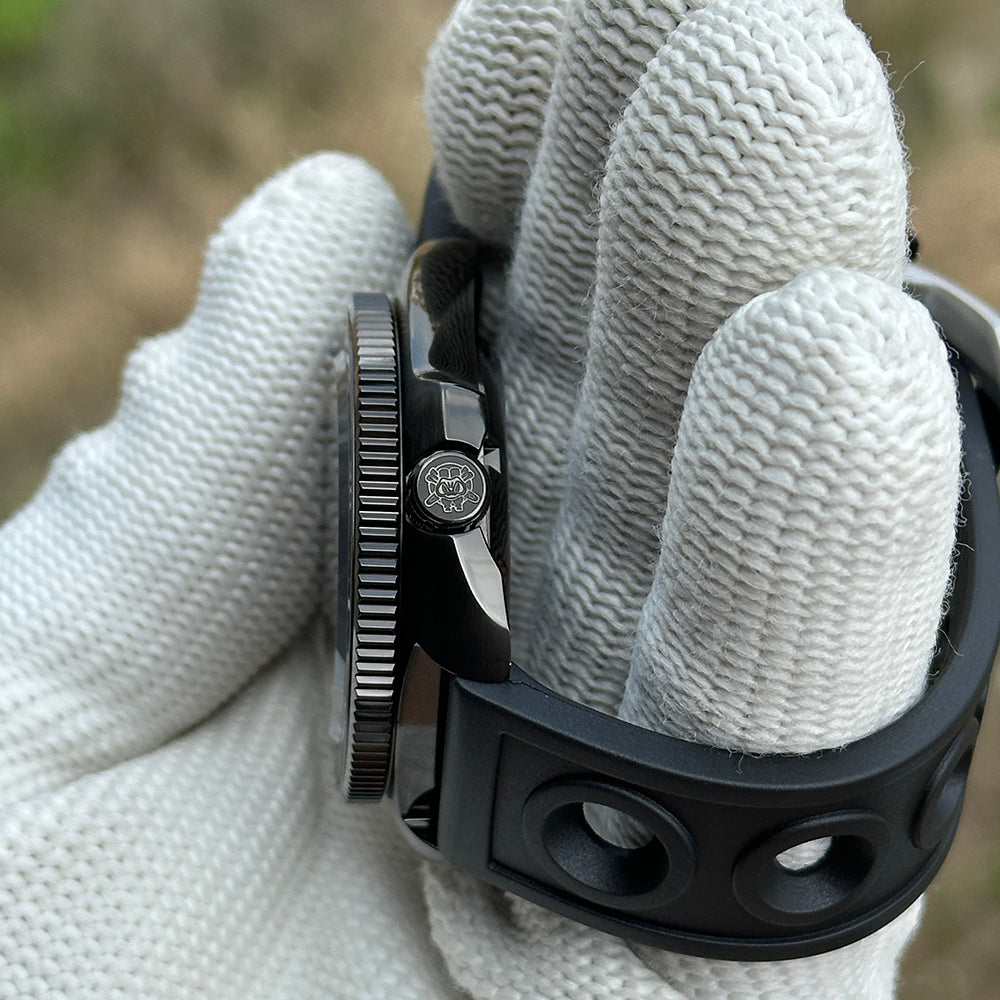Side profile of the STEELDIVE SD1970X showing the signed crown and coin-edge bezel