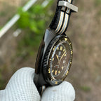 Profile view of the STEELDIVE SD1970X case and bezel on a nylon NATO strap
