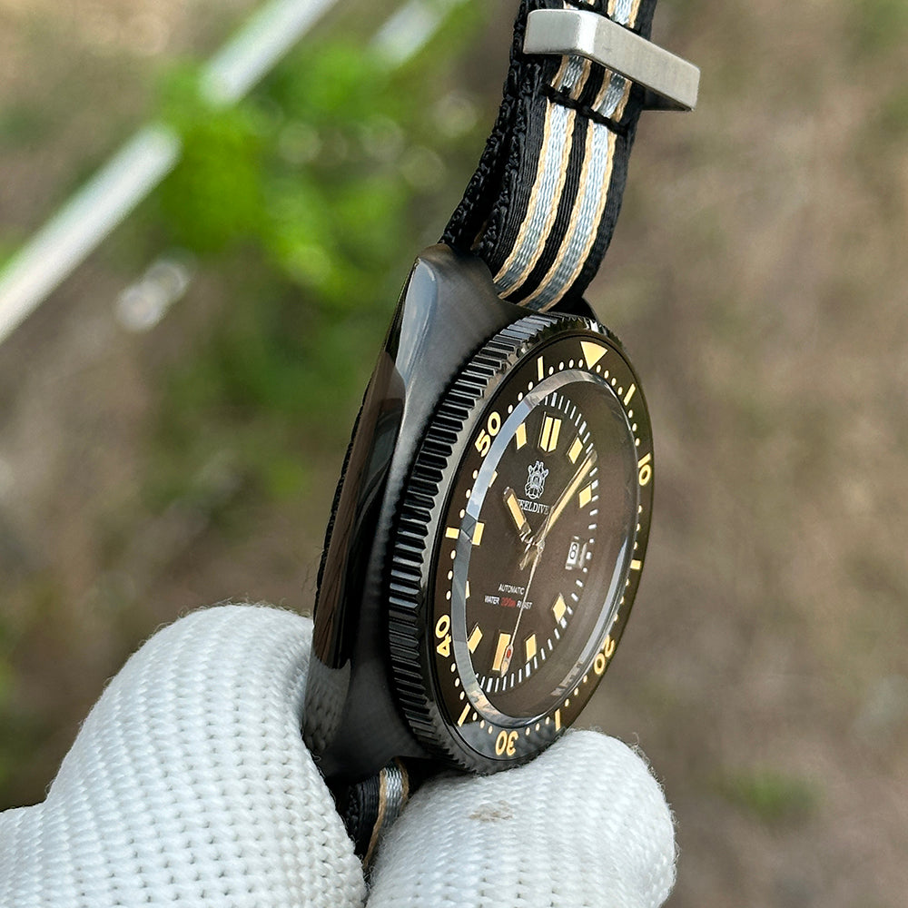 Profile view of the STEELDIVE SD1970X case and bezel on a nylon NATO strap