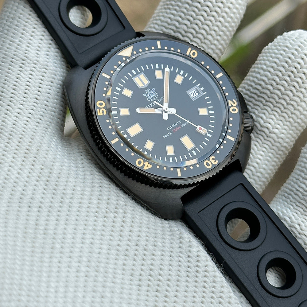 STEELDIVE SD1970X black PVD dive watch on a black rubber strap, three-quarter view