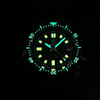 STEELDIVE SD1970X dial glowing green and blue in the dark, lume on the hands, markers and bezel