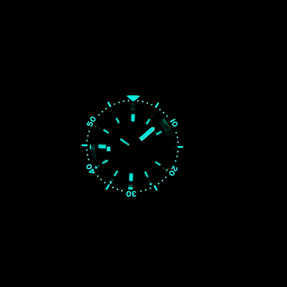 STEELDIVE SD1977T bezel and dial glowing blue in the dark
