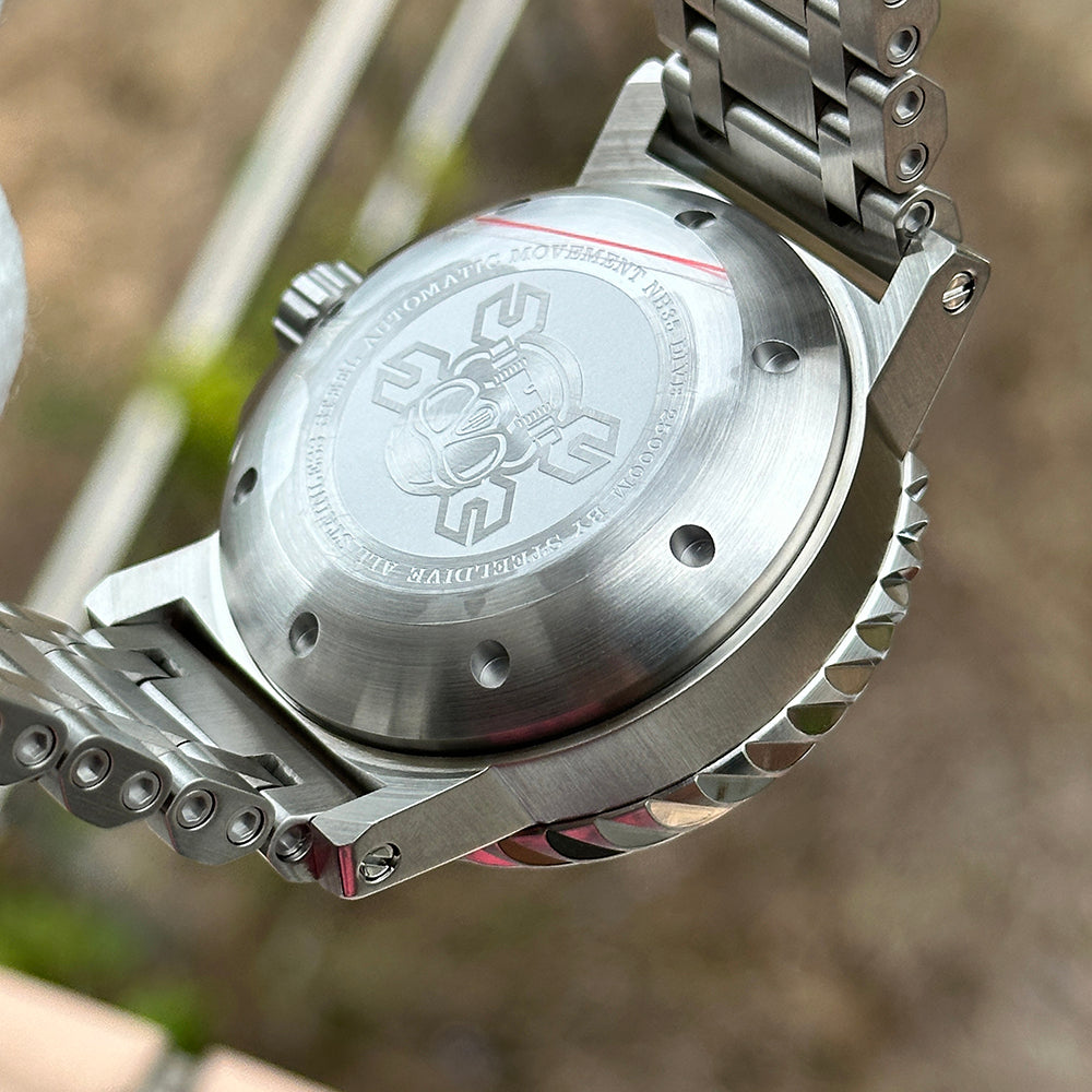 Engraved caseback of the STEELDIVE SD1982F on its steel bracelet
