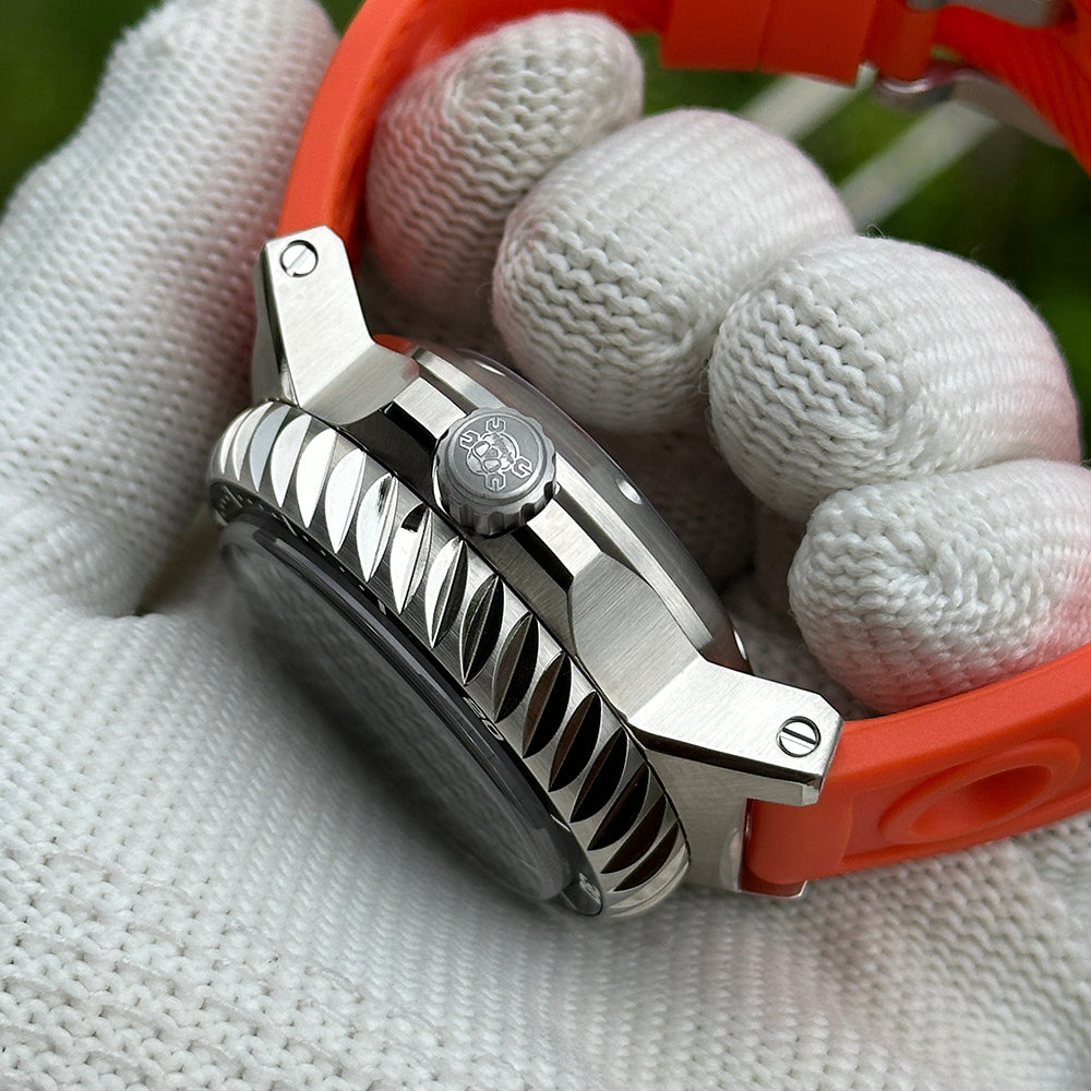 Side profile of the STEELDIVE SD1982F showing the fluted bezel edge and orange strap