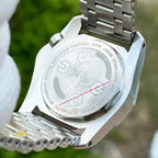 Engraved caseback of the STEELDIVE SD2211 fitted to its steel tank bracelet
