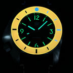 STEELDIVE SD2211 glowing in the dark, orange bezel lit yellow and the markers green
