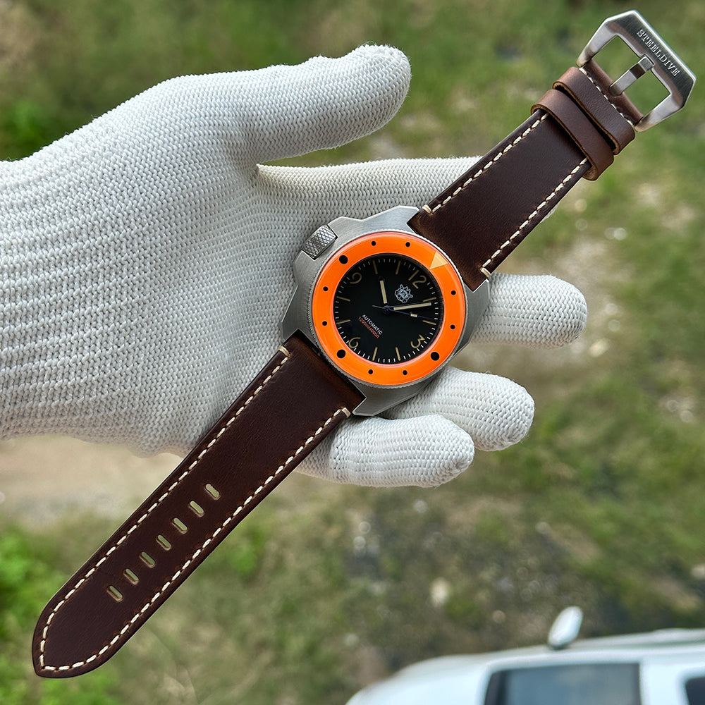 STEELDIVE SD2212 dial close-up marked Automatic 1200m 4000ft on brown leather