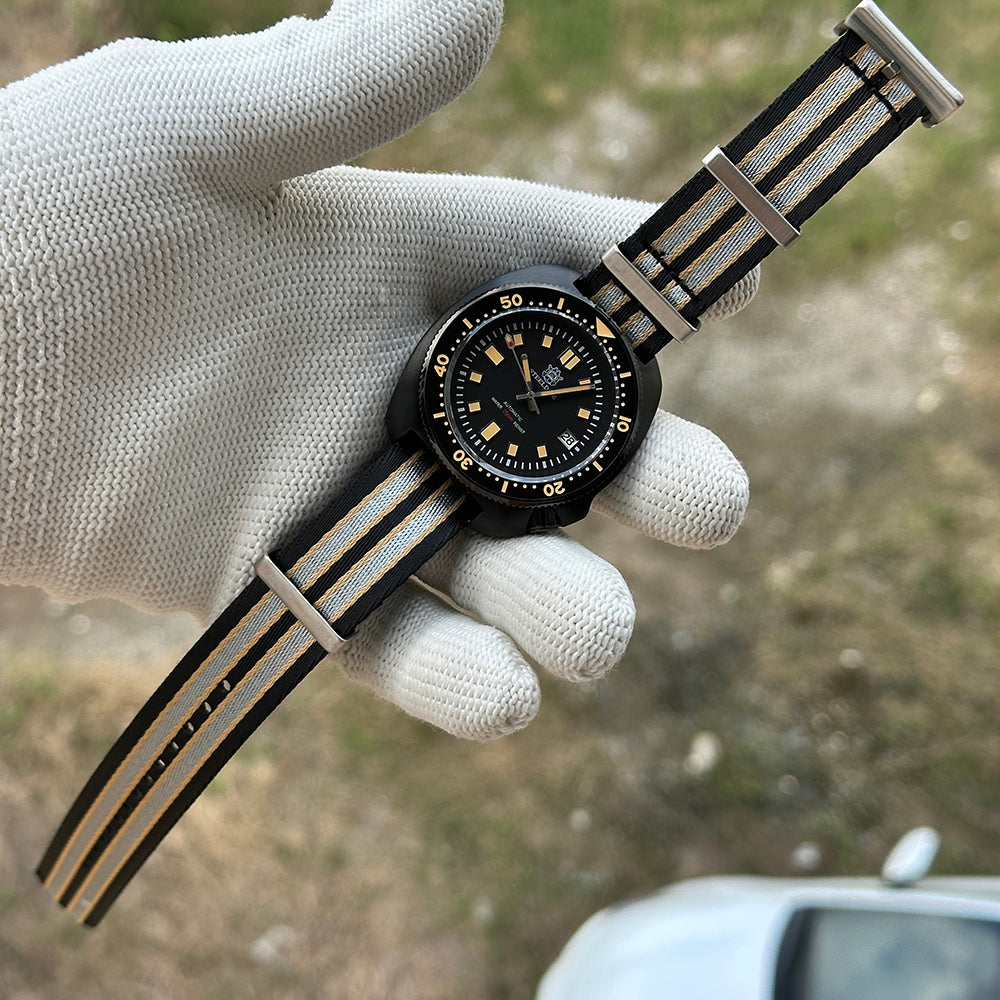 STEELDIVE SD1970X on a nylon NATO strap resting across a gloved palm