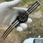 STEELDIVE SD1970X on a nylon NATO strap resting across a gloved palm