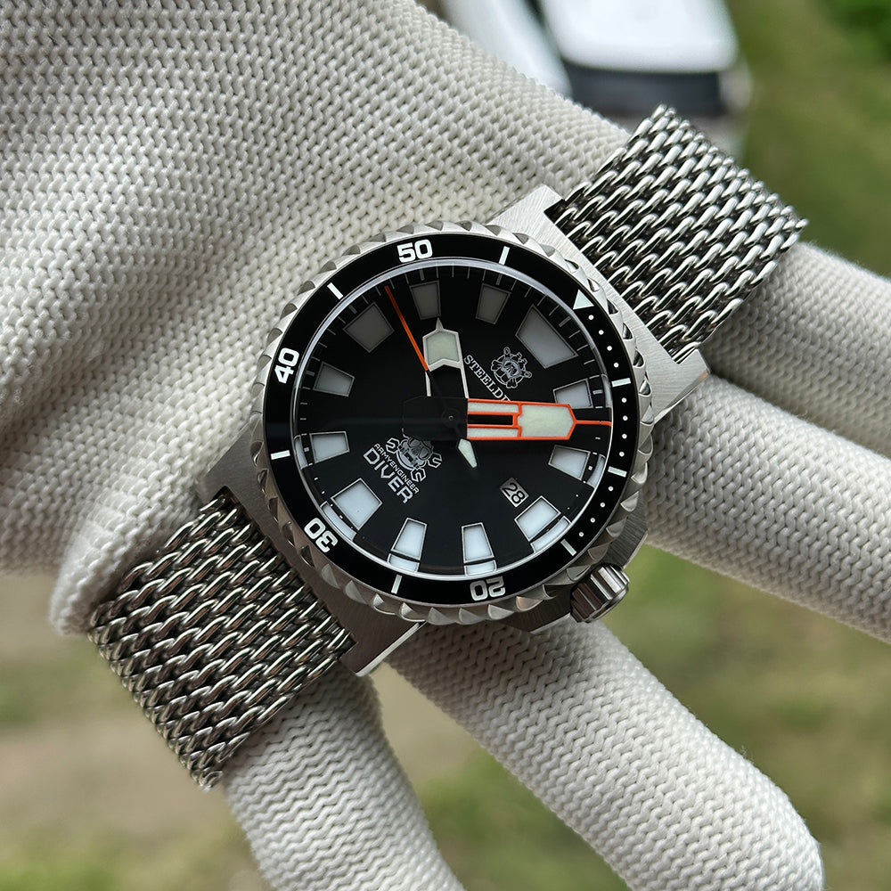 STEELDIVE SD1982F on a steel mesh bracelet held across a gloved palm