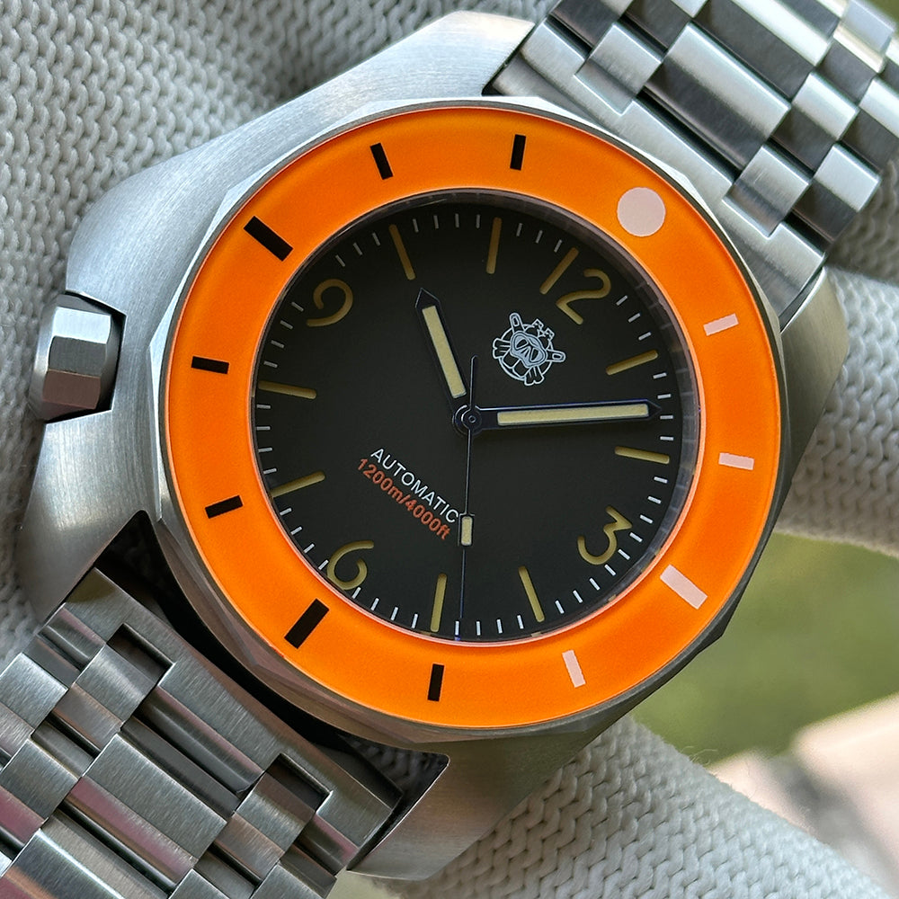 STEELDIVE SD2211 black dial and orange bezel on a steel tank bracelet