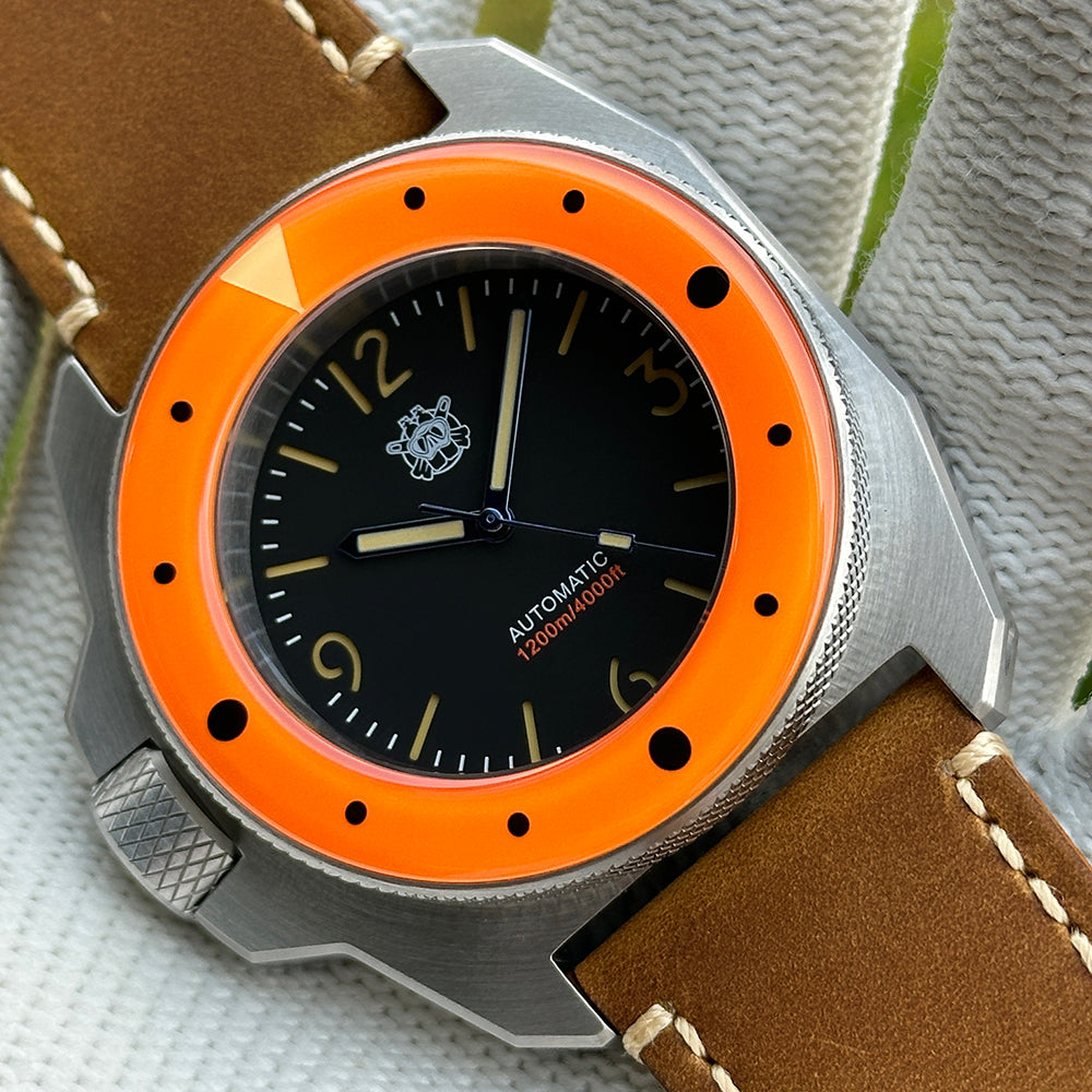 STEELDIVE SD2212 black dial and orange bezel on a dark brown leather strap, angled