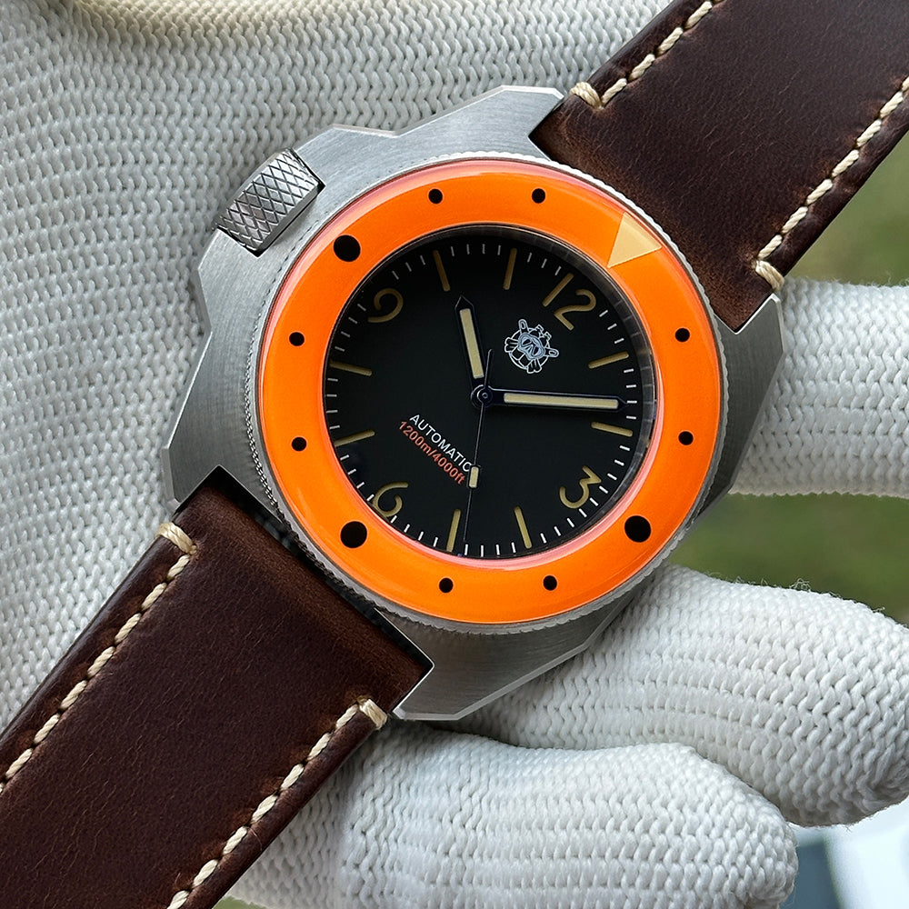 STEELDIVE SD2212 orange bezel and black dial on a dark brown leather strap