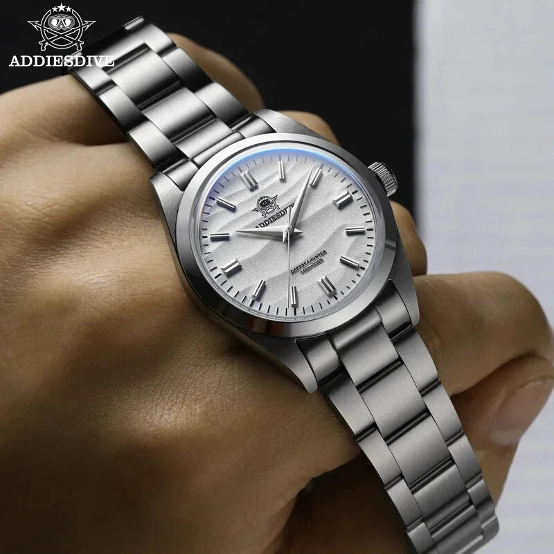 ADDIESDIVE AD2030 36MM Deepseahunter dive watch with white wave dial and steel bracelet, held in hand