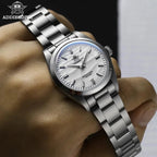 ADDIESDIVE AD2030 36MM Deepseahunter automatic with white wave dial and steel bracelet, held in hand