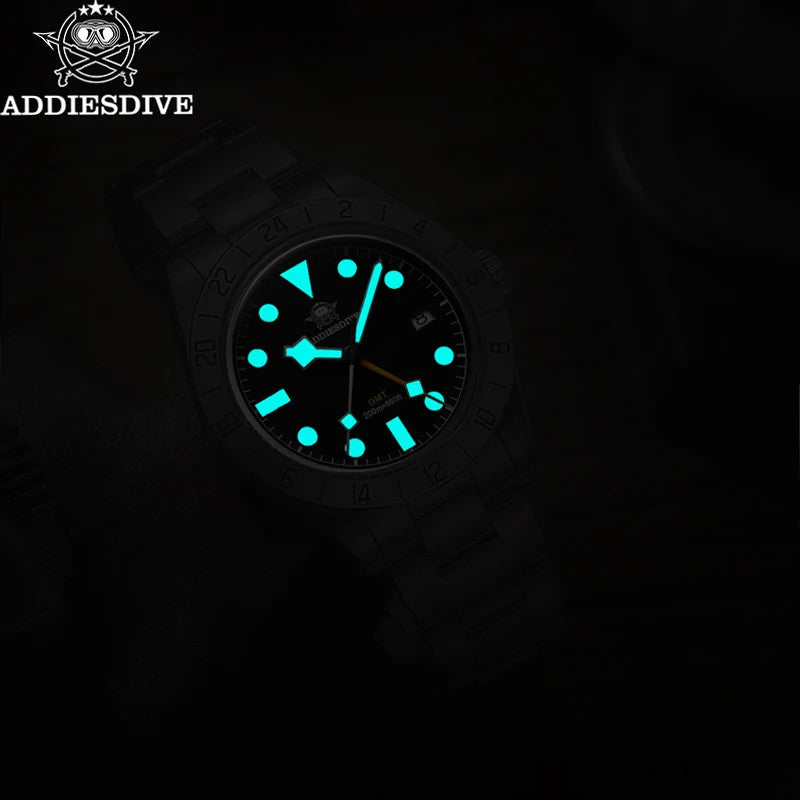 ADDIESDIVE AD2035 39MM Deepseahunter GMT quartz showing bright cyan luminous hands and markers in dark