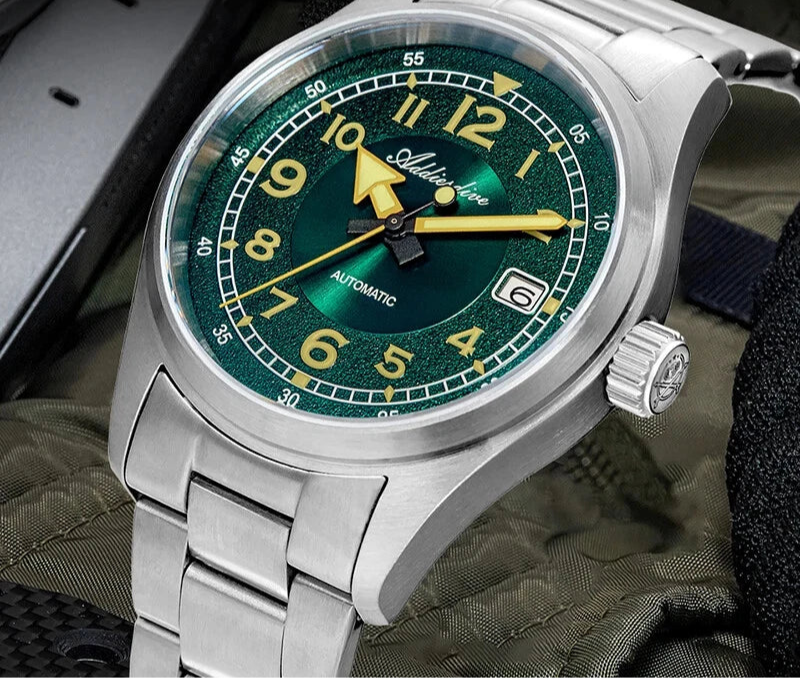 ADDIESDIVE AD2055 39MM NH35 automatic field watch with green sunburst dial and steel bracelet, angled view