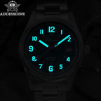 ADDIESDIVE AD2070 automatic field watch with green dial and steel bracelet, lifestyle shot with compass