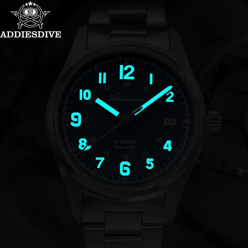 ADDIESDIVE AD2070 automatic field watch with green dial and steel bracelet, lifestyle shot with compass