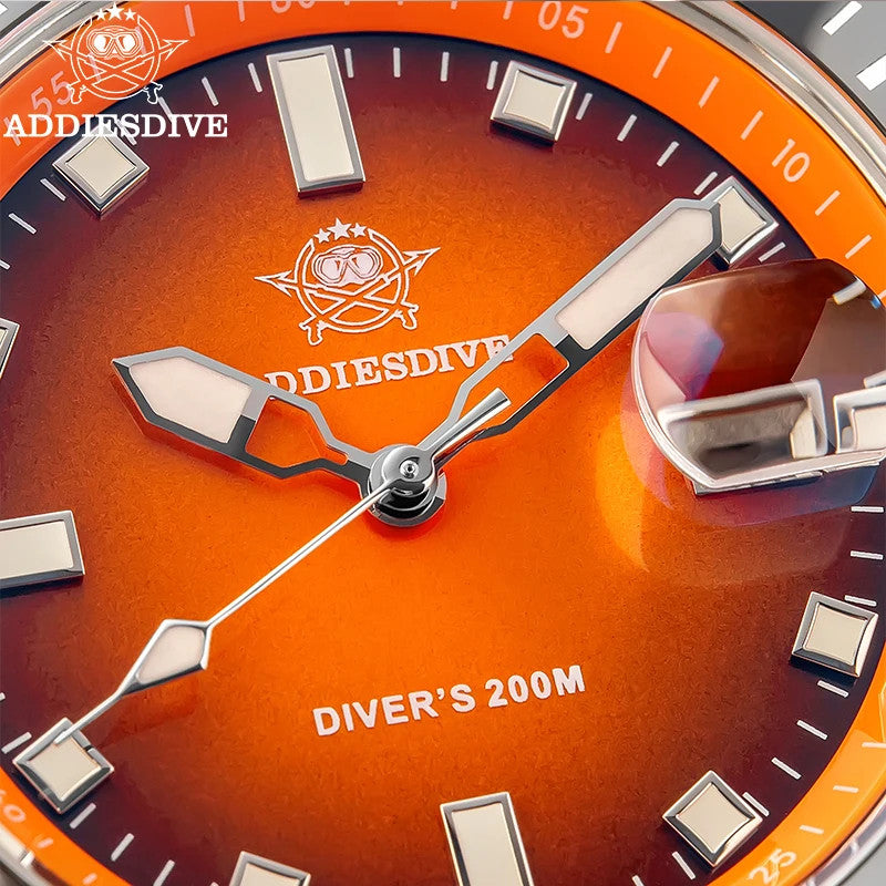 ADDIESDIVE AD2089 Diver's 200M quartz macro close-up of orange sunburst dial showing applied indices and signed sword hands