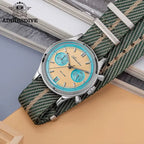 ADDIESDIVE AD2095 quartz chronograph with beige dial and green-beige NATO strap, lifestyle shot on wood