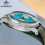 ADDIESDIVE AD2095 quartz chronograph with teal dial and green-beige NATO strap, side profile showing case and pushers