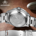ADDIESDIVE AD2101 vintage automatic dive watch caseback with engraved ADDIESDIVE emblem, lifestyle shot on leather