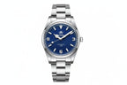 ADDIESDIVE AD2112 automatic Explorer-style with blue dial, 3-6-9 Arabic numerals and steel oyster bracelet, front view