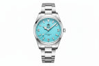 ADDIESDIVE AD2112 automatic Explorer-style with sky blue dial, 3-6-9 Arabic numerals and steel oyster bracelet, front view
