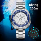 ADDIESDIVE AD2507 turtle-style diver quartz 200m diving feature shot with white dial, blue bezel and lume inset, underwater
