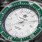 ADDIESDIVE AD2507 turtle-style diver quartz close-up of white fluted dial and green ceramic bezel