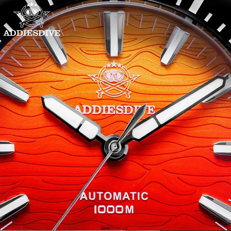 ADDIESDIVE AD2526 1000M automatic dive watch macro close-up of red sunset dial showing applied indices and signed hands