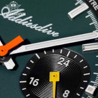 ADDIESDIVE AD2529 quartz chronograph macro close-up of green dial showing Addiesdive signature and black sub-register with