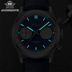 ADDIESDIVE AD2529 quartz chronograph showing bright cyan luminous hands, markers and sub-registers in dark