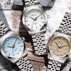 ADDIESDIVE 39MM automatic watch showing white, ice blue and sand dial variants with steel bracelets on snowy rocks